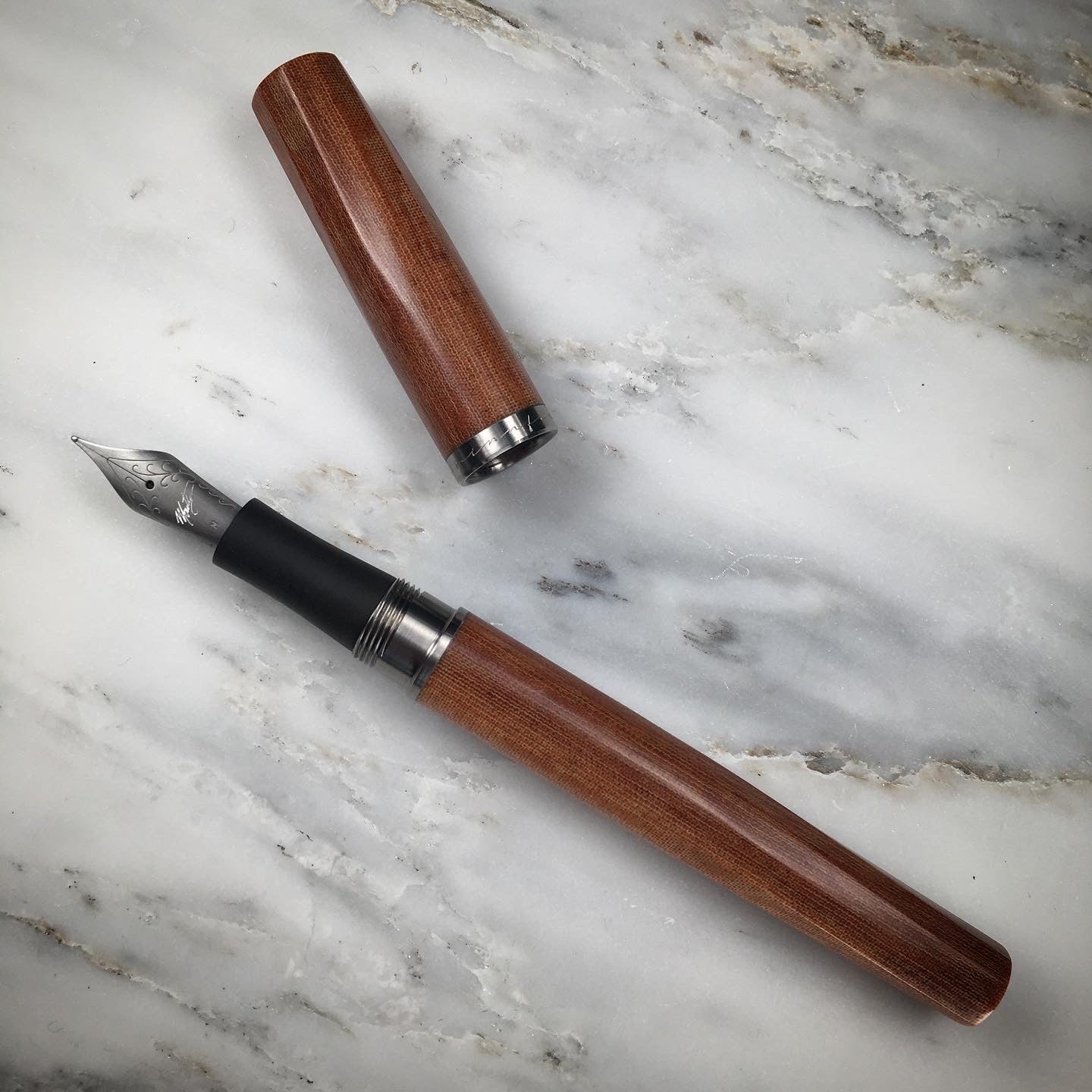 Model 4. Faceted Linen Micarta Fountain Pen with Titanium Hardware