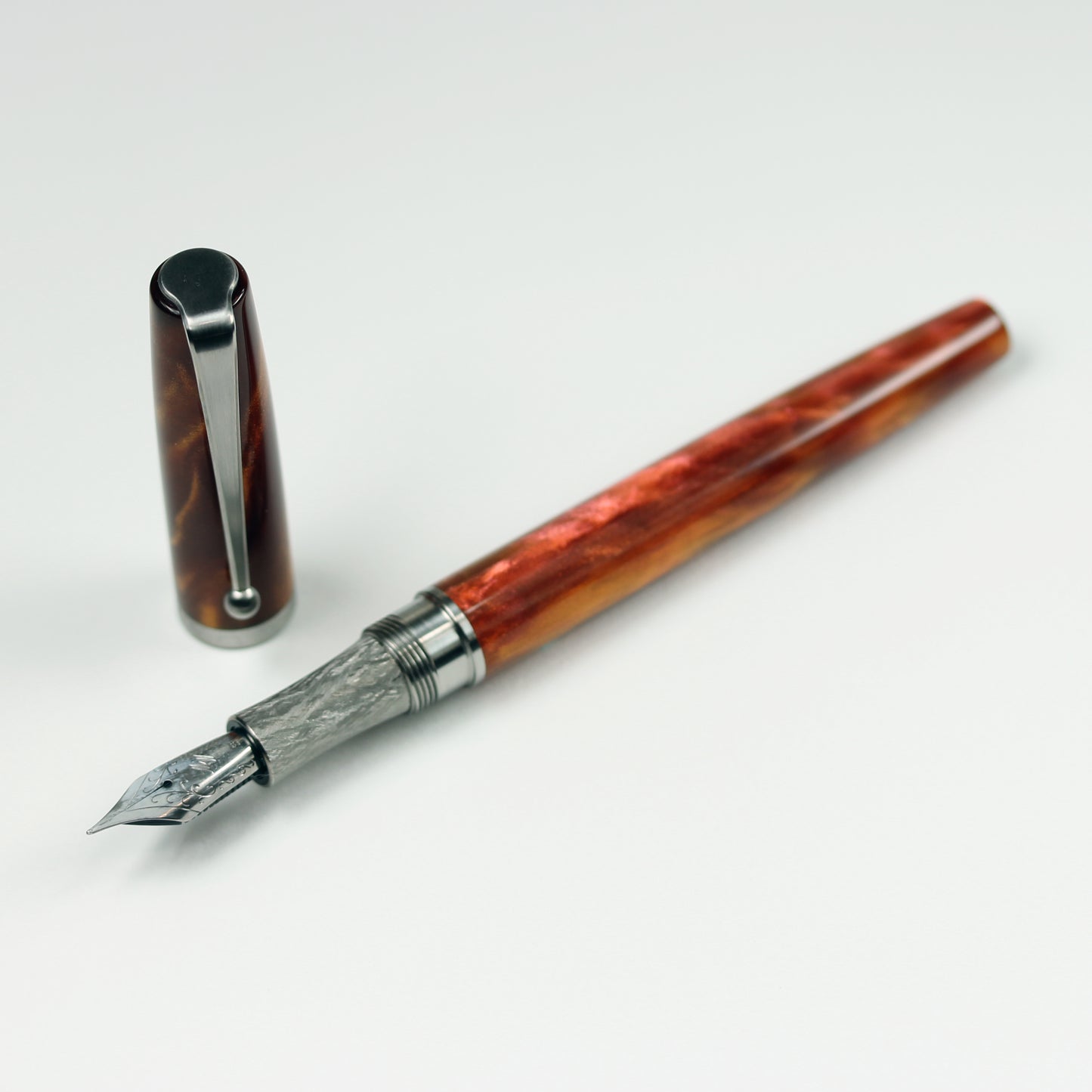 Model 1. Orange Sapphire Alumilite Fountain Pen with Titanium Waterfall Clip