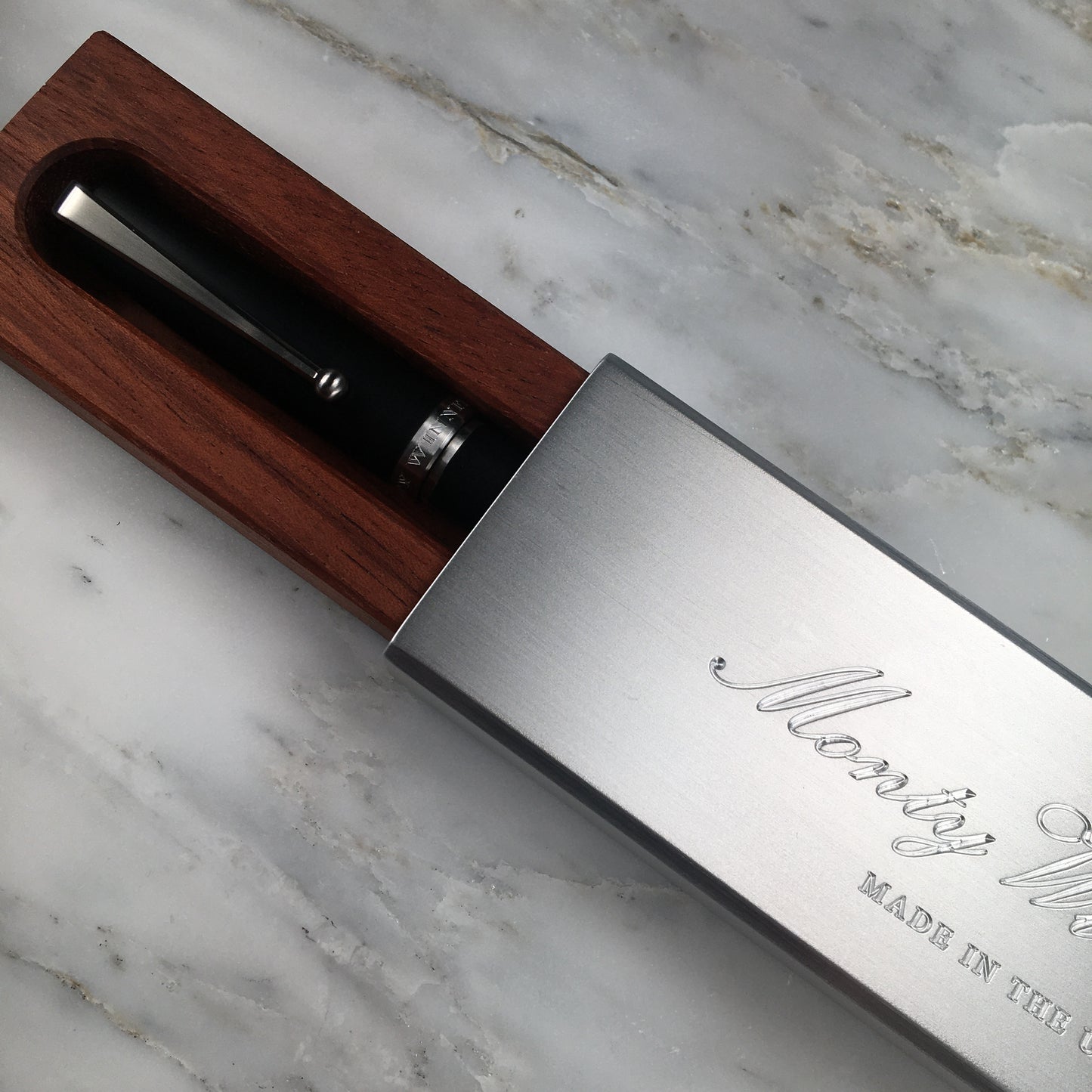 Model 1. Ebonite Fountain Pen with Titanium Waterfall Clip and Hand-Scraped Titanium Grip