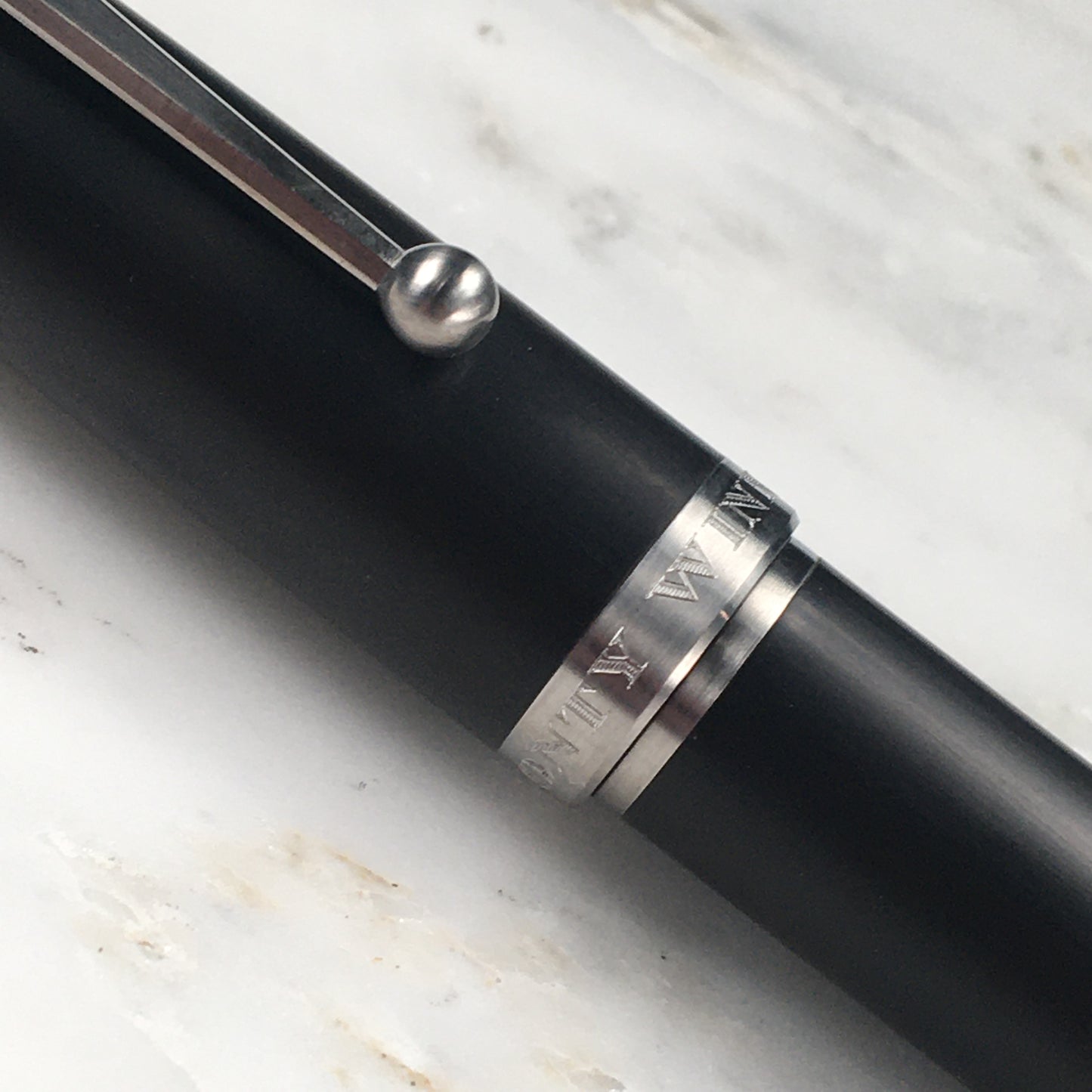 Model 1. Ebonite Fountain Pen with Titanium Waterfall Clip and Hand-Scraped Titanium Grip