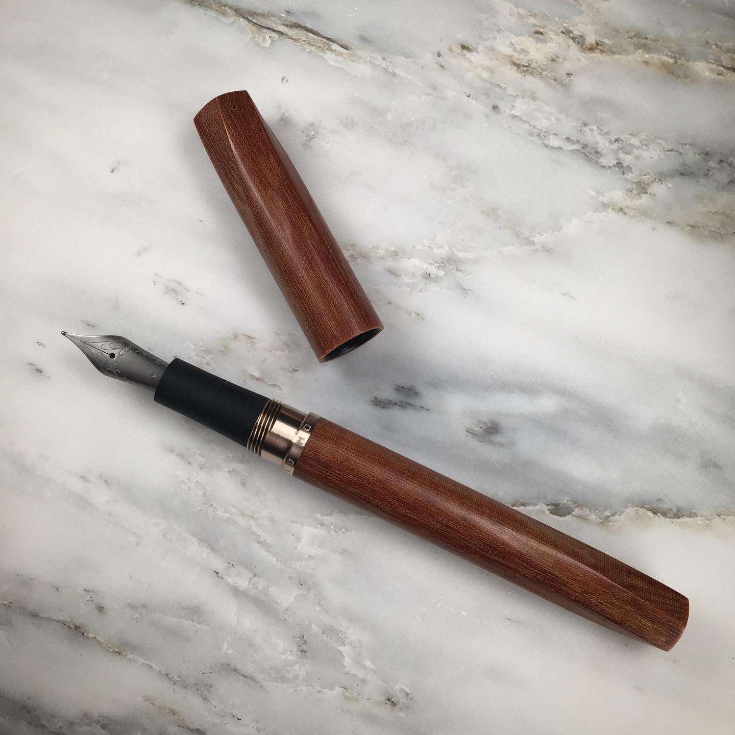 Model 5. Faceted Linen Micarta Fountain Pen with Bronze Hardware