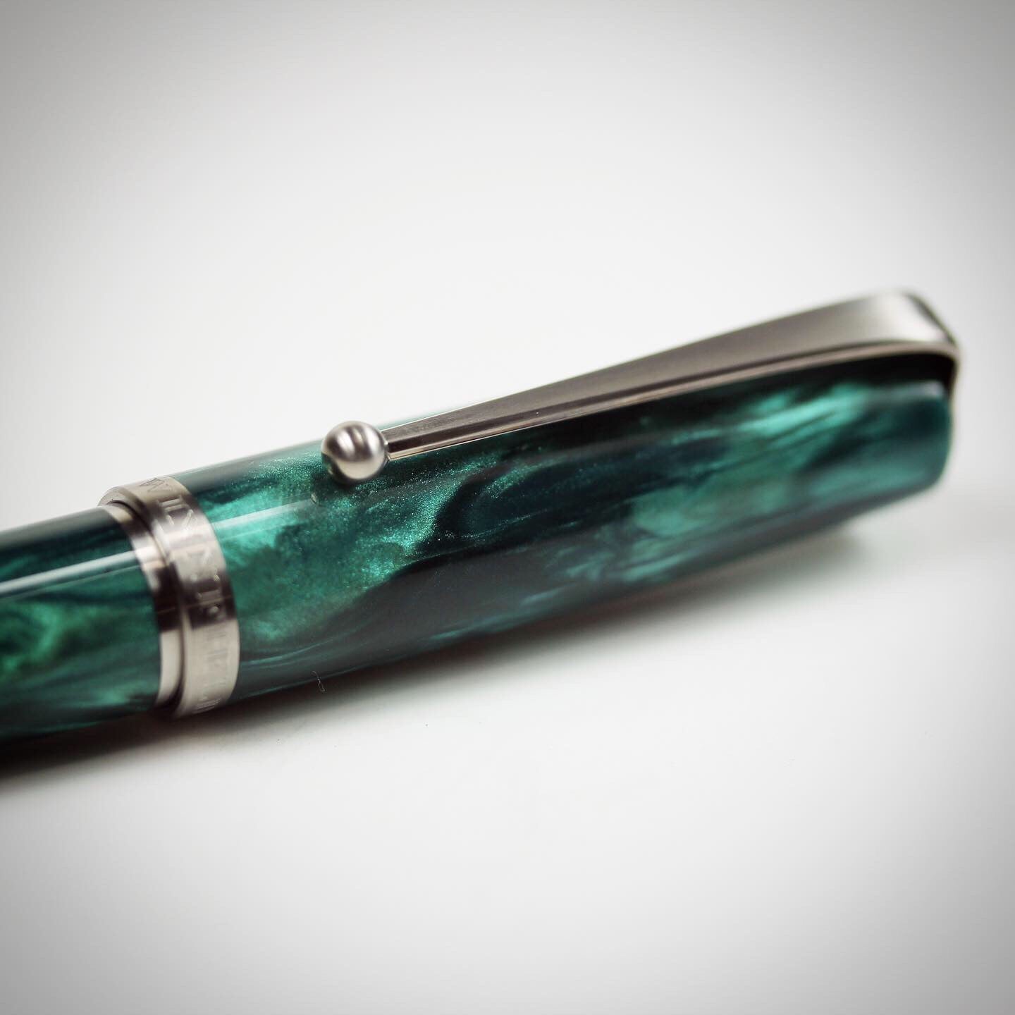 Model 1. Emerald Green Alumilite Fountain Pen with Titanium Waterfall Clip