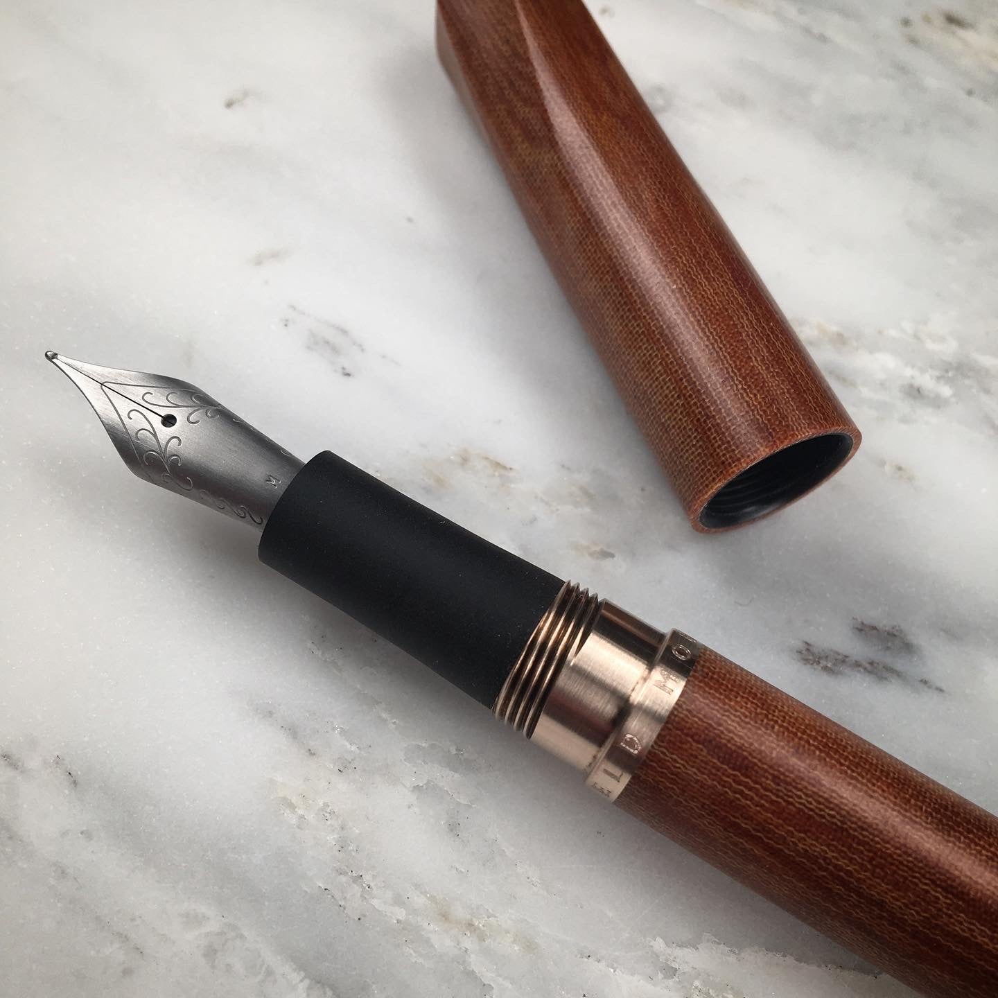 Model 5. Faceted Linen Micarta Fountain Pen with Bronze Hardware