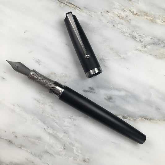 Model 1. Ebonite Fountain Pen with Titanium Waterfall Clip and Hand-Scraped Titanium Grip